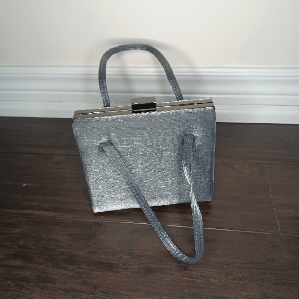 Silver-gray satin hand bag with shoulder strap